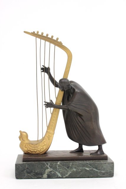 Hans Muller ormolu & patinated bronze figure: Depicting "Harpist". Approx. 9" H. Condition: Strings slightly bent. From the Chris Peckham Estate.