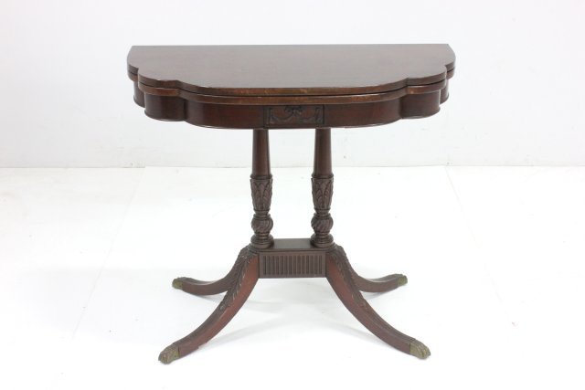 Federal style mahogany games table: Approx. 30" H x 34" W x 17" D. ca. 1930s