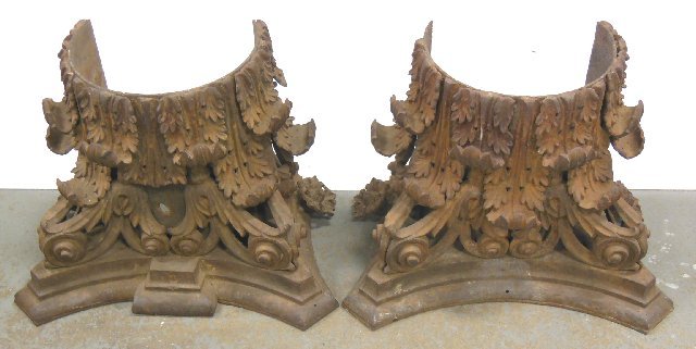 Pair Neo Classical style Corinthian capitals: Cast iron, rusting. Approx. 14.5" H x 21" W x 13 D. From the estate of Chris Peckham.