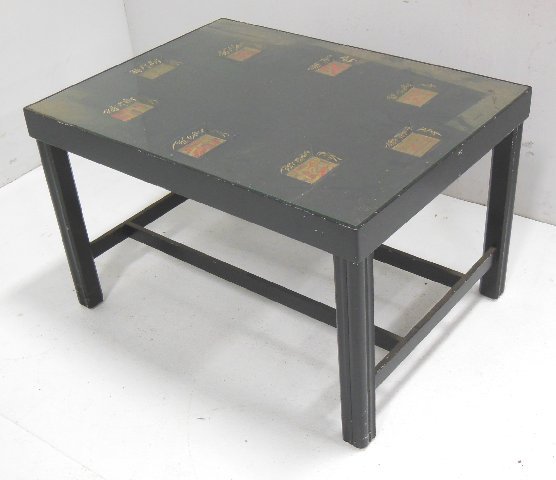 Georgian style black lacquer coffee table: Inset with Chinese Export chip cups. Approx. 19.5" H x 31" W x 23" deep. Condition: some wear to paint. From the Estate of Chris Peckham.