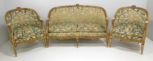 French style gilt wood salon set ca. mid 20th c.: Including: Loveseat & pair of chairs, "Floral" upholstery, down cushions, carved rosettes in center. Loveseat approx. 53" across x 24" D x 34.5" H back.