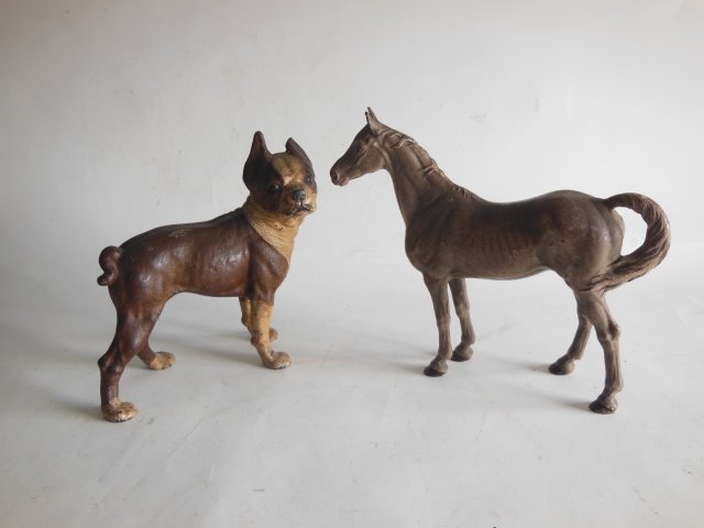 Iron patinated "Bulldog" & "Horse" doorstops: Ear broken on dog, approx. 10 1/4" H x 12". Unusual patinated horse doorstop, approx. 11 1/2" x 12 1/8"20thc