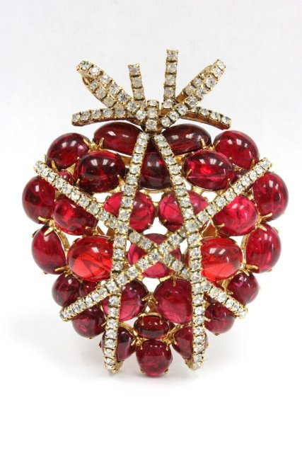 Iradj Moini wrapped heart pin/pendant: Early piece by Moini and is homage to a ruby and diamond brooch by Duke Fulco di Verdura, who is most well known for his collaboration with CoCo Chanel. Gripoix glass red cabachon stones and briallian