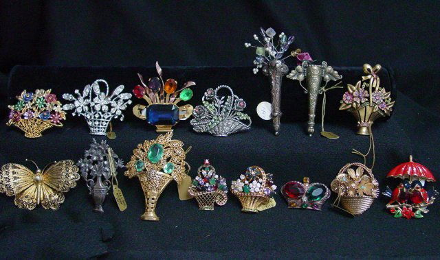 Costume jewelry brooch lot: Approx. 15 pieces, including a Coro pin, semi-precios stones, Sterling and enamel. From the estate of Anita Stern, owner of This-N-That antiques store, NYC.