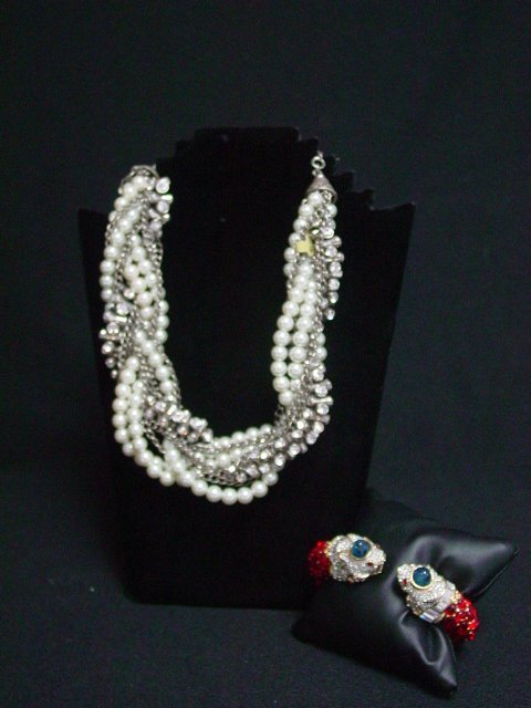Kenneth Lane bracelet and necklace: Early Kennth Lane mark on both the necklace and bracelet. Chain necklace in oxidized silver tone with rhinestones and simulated pearls. Approx. 13" length with 3 1/2" of added adjustable chain. Bracel