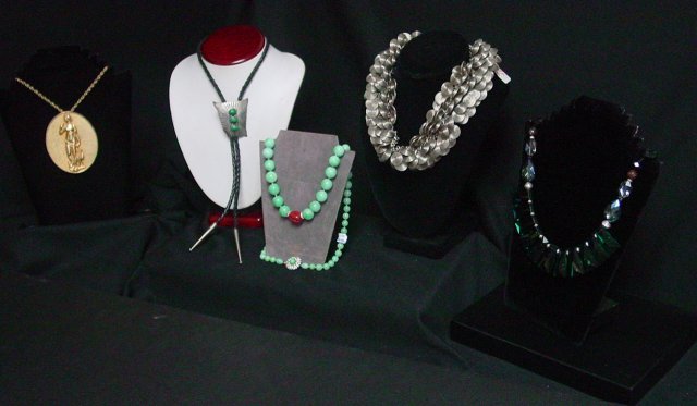 Costume jewelry necklace lot: Approx. 5 pieces including Judith Leiber pendant necklace. Chain approx. 28" long, pendant approx. 3 1/4" long. Handmade alpaca spiral disc necklace, approx. 16" length, with 3" of adjustable chain. J