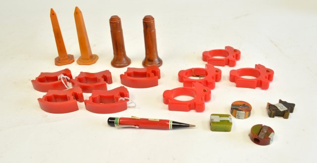 Bakelite napkin rings, pencil sharpeners & shakers: Approx. 2 sets of red napkin rings shaped like rabbits and rocking horses. A group of pencil sharpeners. Salt and pepper shakers. From the estate of Anita Stern, owner of This-N-That antiques store, N