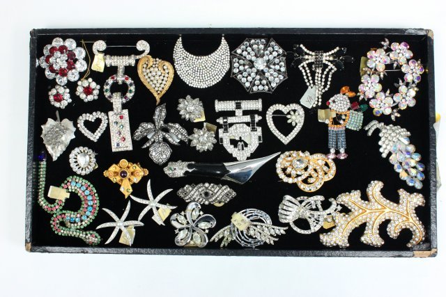 Crystal and rhinestone pins: Approx. 30 pins. Includes pieces from Kenneth J Lane, Vendom and Ciner. From the estate of Anita Stern, owner of This-N-That antiques store, NYC.