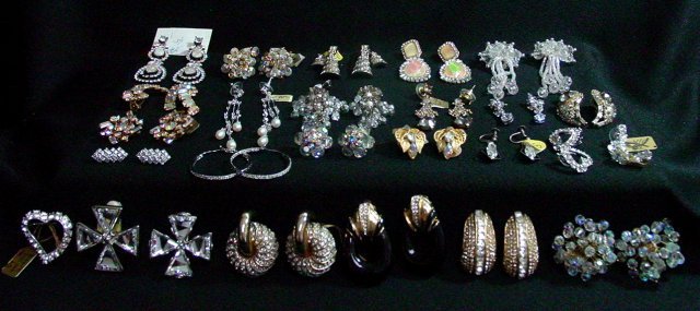 Crystal and rhinestone earrings: Approx. 15 sets. Includes pieces by Kenneth J Lane and Kramer. From the estate of Anita Stern, owner of This-N-That antiques store, NYC.