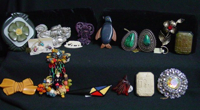 Costume jewelry brooch lot 16 pieces: Includes vintage 1920's Miriam Haskell wooden bead floral brooch. Approx. 4 1/2" long. Rhinestones, silver and turquoise. From the estate of Anita Stern, owner of This-N-That antiques store, NYC.
