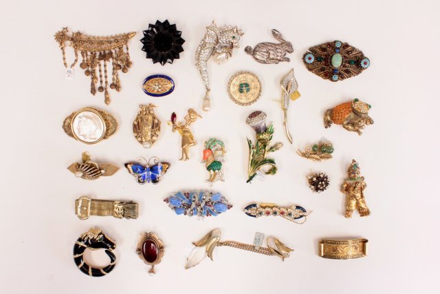Animal, insect and flower motif fashion pins: Approx. 20 pins. Includes pieces from Coro and Corocraft, Ciner, Hattie Carnegie and DeNicola. From the estate of Anita Stern, owner of This-N-That antiques store, NYC.