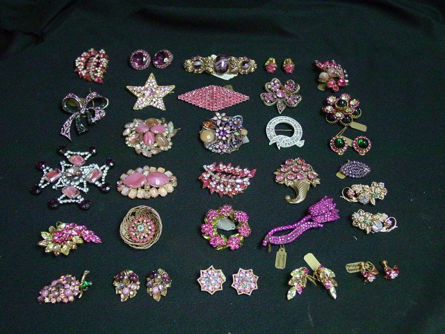 Pink toned rhinestone & crystal earrings & pins: Appro. 20 pieces. Includes pieces by Kenneth J Lane and Symphony Original. From the estate of Anita Stern, owner of This-N-That antiques store, NYC.
