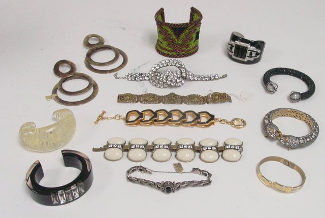 Onyx, marcasite and inlaid lucite bracelets: Approx.12 bracelets including pieces by Kenneth J Lane and Ex Novo. From the estate of Anita Stern, owner of This-N-That antiques store, NYC.