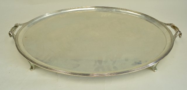 English sterling silver footed tray, oval: Charles & Richard Comyns 1922 London. Approx. 110 ozt, 25 1/2" x 17 1/2. From the Estate of Chris Peckham