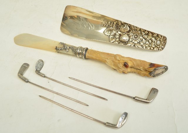 Sterling silver desk items: Deer foot, Mother of Pearl and sterling silver letter opener, floral gorham shoe horn and 4 sterling silver golf club picks, approx. 2.7 ozt weighable silver From the Estate of Chris Peckham