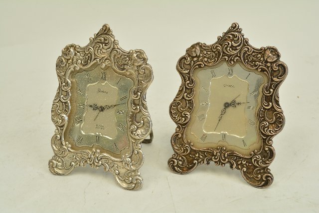 Two Gorham Sterling Silver Cyma Desk Clocks: Approx. 4 3/4" high. From the estate of Chris Peckham.