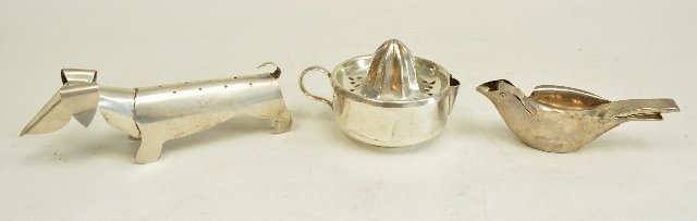 Miyamoto-Shoko, Mexican, & Christofle items: Sterling silver dog, sterling silver hand wrought bird squeezer, and Christofle plated orange juice squeezer. Approx. 7.5 ozt. From the estate of Chris Peckham