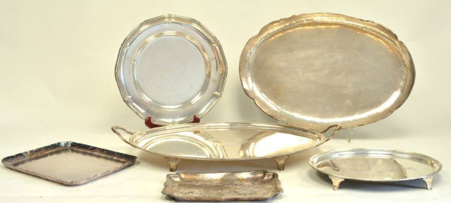 6 assorted silver plated trays: Largest approx. 23" x 13.75". From the estate of Chris Peckham.