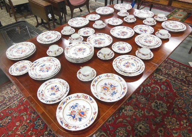Portuguese porcelain dinnerware set "Floral": Including: 12- soup plates (1 chipped) 12- cups 12- fruit cups 12- dessert plates 10- salad plates 9- dinner plates. 67 pieces in total.