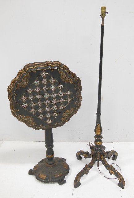 Victorian papier mache table & tole lamp: Including 1 - Mother-of-pearl papier mache table, approx. 28.25" H x 22" diam, some chips and wear on base, wear to decoration. and 1 - Victorian games tole lamp.