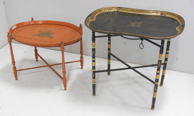 Victorian gilt black painted tole tray on stand: Together with an orange tole tray on stand 27 1/2"H x 21"W Some wear to decoration, chips and scratches From the estate of Chris Peckham