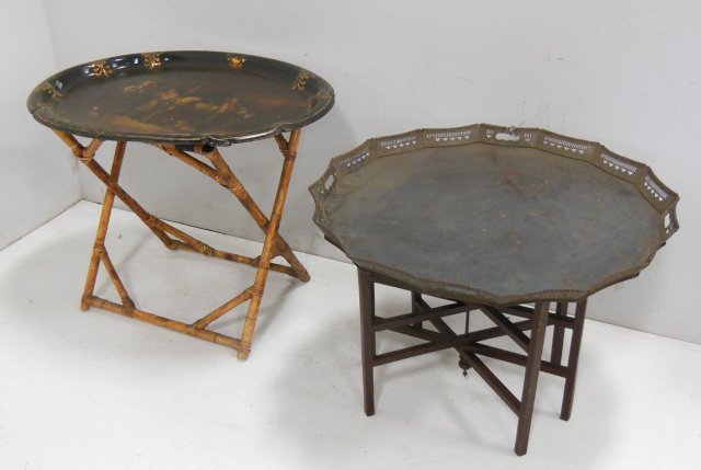 Victorian polychromed papier mache tray: 25"H x 31 3/4"W x 24"D on rattan stand together with a tole tray on hexagonal stand. Cracking, chips, wear, tole finish gone. From the estate of Chris Peckham. Victorian