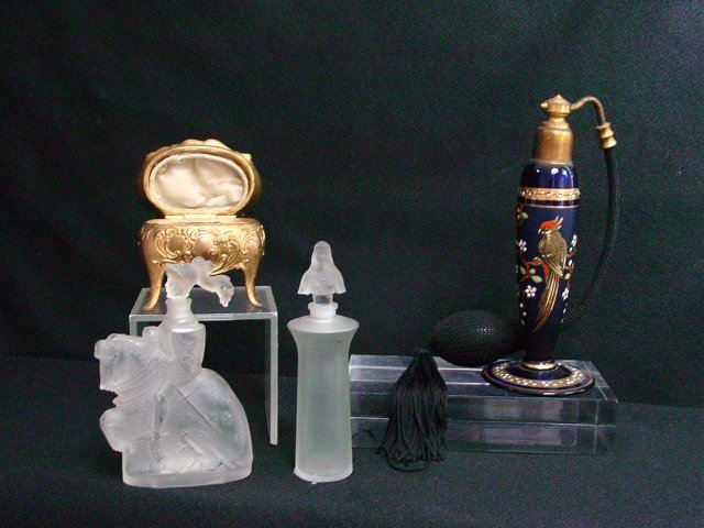 R. Lalique c. 1920s knight perfume bottles: Approx. 4 pieces. with jewelry box. From the estate of Anita Stern, owner of This-N-That antiques store, NYC.