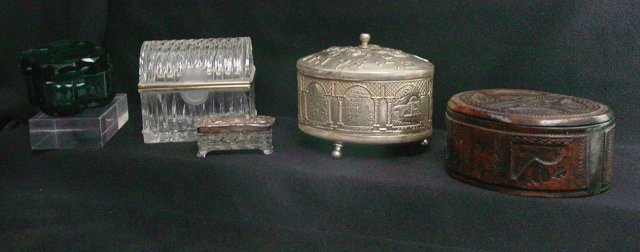 Sterling and glass dresser boxes: Approx 5 pieces.1 Sterling ring box, 1 hand tooled leather box, 1 souvenir box. 1 glass dresser box and 1 large glass jewelry box. From the estate of Anita Stern, owner of This-N-That antiques store, 