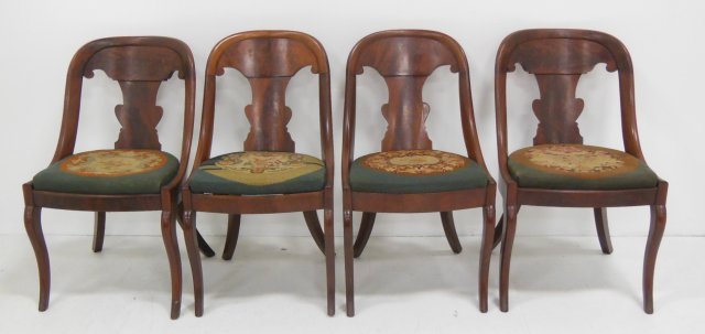 4 mid 19th c mahogany chairs: American round back, with needlepoint seats. Approx. 31" H (back) x 17" across.(From the Estate of Chris Peckham)