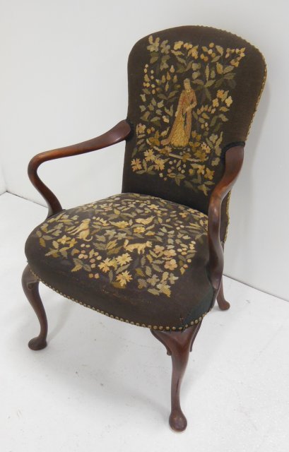 Needlepoint crook arm chair: Approx. 36.5" H (back) x 23" across. (From the Estate of Chris Peckham)