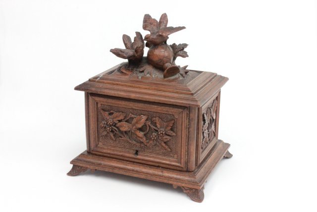 Old Black Forest carved wood humidor: Minor repair. Approx. 7.25" W x 10.25" H.