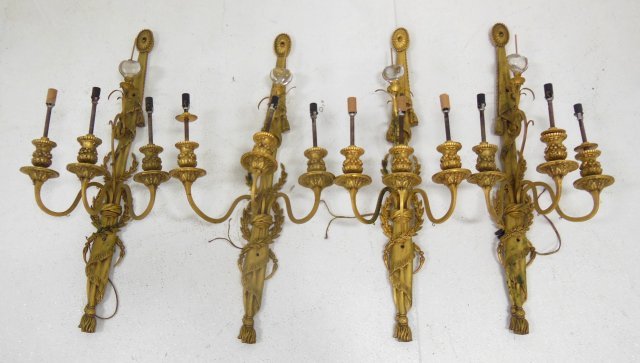 Set of 4 ormolu wall sconces: Possibly by Caldwell. Slightly oxidized in places, one missing screws & a collar. Approx. 32.5" H x 13" W.(From the Estate of Chris Peckham)