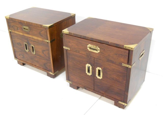 Pair of John Stuart rosewood brass mounted night stands: Approx. 23.5" x 28" x 18" diameter. Veneer chips.