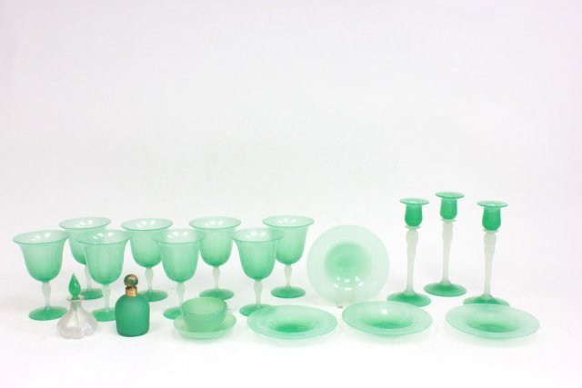 French green and translucent glass dinnerware: Approx. 18 pieces including 8 goblets and 3 candlesticks. Candlesticks H- 8 1/4".