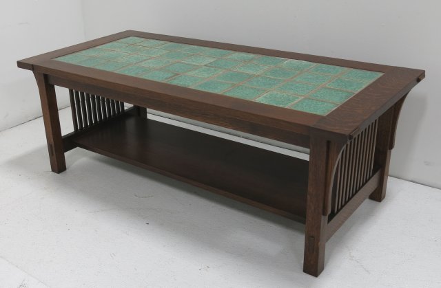 Stickley style mission oak coffee table w/tile top: Some wear to corner. H: 17 1/2", W: 48", D: 22 1/2".