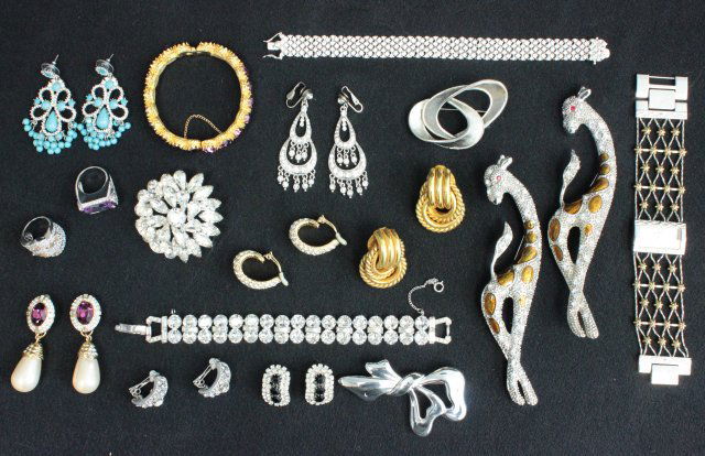 Costume jewelry lot: Including: Ciner, Diane von Fürstenberg, Anne Klein, Arnold Scassi, Monet, Lisa and Weiss. Approx. 25 pieces total.