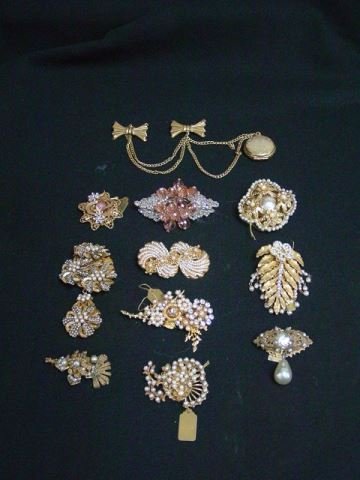 Miriam Haskell Gold tone vintage pins: Approx. 12 pieces by Miriam Haskell. From the estate of Anita Stern, owner of This-N-That antiques store, NYC.