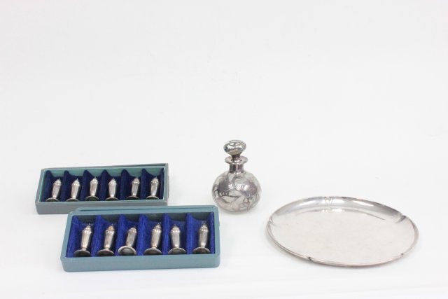 Group Lot of 4 Sterling Silver Items: Including two sets of individual salt and pepper shakers in original fitted boxes, silver overlay perfume bottle ( stopper chipped ), round Kalo tray ( 8 1/2" in diameter).