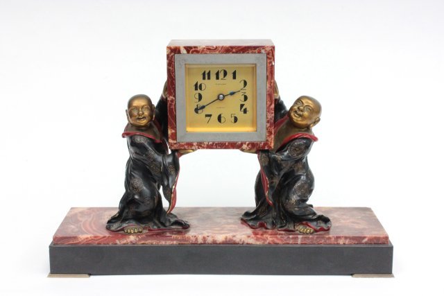 Swiss art deco figural desk clock: Polychromed bronze and marble. By Turler-Zurich. Circa 1930. H: 9 1/2", W: 14 1/2".