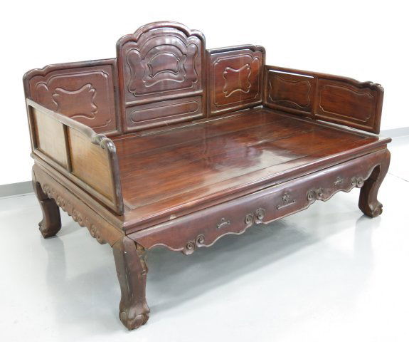Chinese carved hardwood opium bed: Late 19th c/early 20th c., panels loose, some age cracks, staining, scratches. Approx. 46.5" H x 71" W x 43" D.