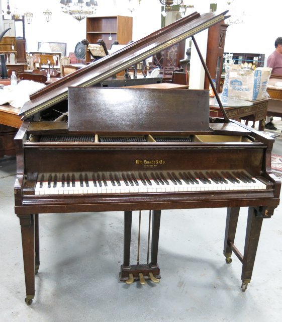 Knabe baby grand piano with bench: Varnished case. Approx. 58" long.