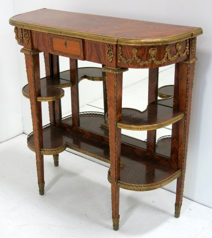 Louis XV style rosewood dessert stand: Mirrored back, bronze mounted, with 1 drawer. Approx. 39" H x 40" W x 14.75" D.