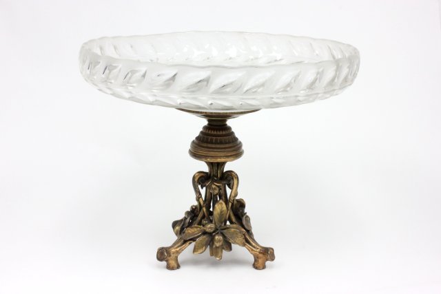 Christofle centerpiece with glass insert: Floral metal base with glass insert. Signed and numbered. Approx. 12" H x 15" D. Good condition.