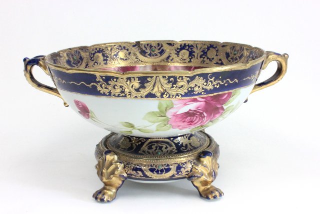 Nippon bowl on footed base: With 2 handles. Approx. 8" H on base x 16" W. (3433)