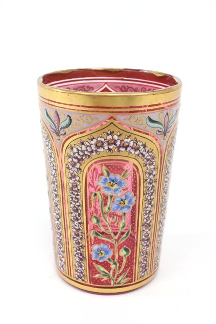 Moser enameled cranberry glass: Gilt and floral design. Approx. 4" H.