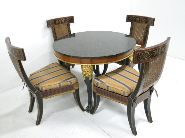 Empire style round table with 4 chairs: Granite top, gilt painted mounts. Chairs paint decorated. Table approx. 30" H x 40" D. Purchased for $15,000 from Juan Molyneux. Good condition.