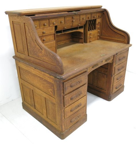 Victorian oak roll top desk: Approx. 50" H x 55" W x 34.25" W. (3437) General wear scratches.