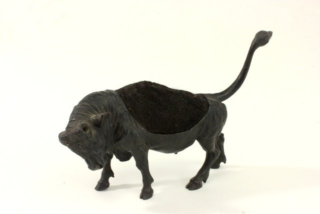 Bronze Bull Pin Cushion: Approx. 8" high, 11" across Missing horns.