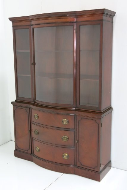 Drexel mahogany china cabinet: Curved glass center. Approx. 70" H x 48" W x 14" D. Good condition.
