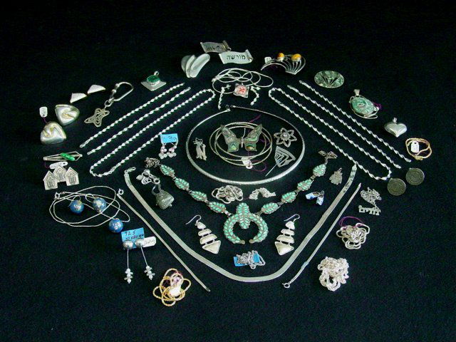 Lot of assorted silver: Including: Robert Lee Morris vintage silver "Heart" pin, approx. 2.25" x 1.5". Native American silver necklace with inlaid turquoise, approx. 18" L. Total 60 pieces. Good condition.